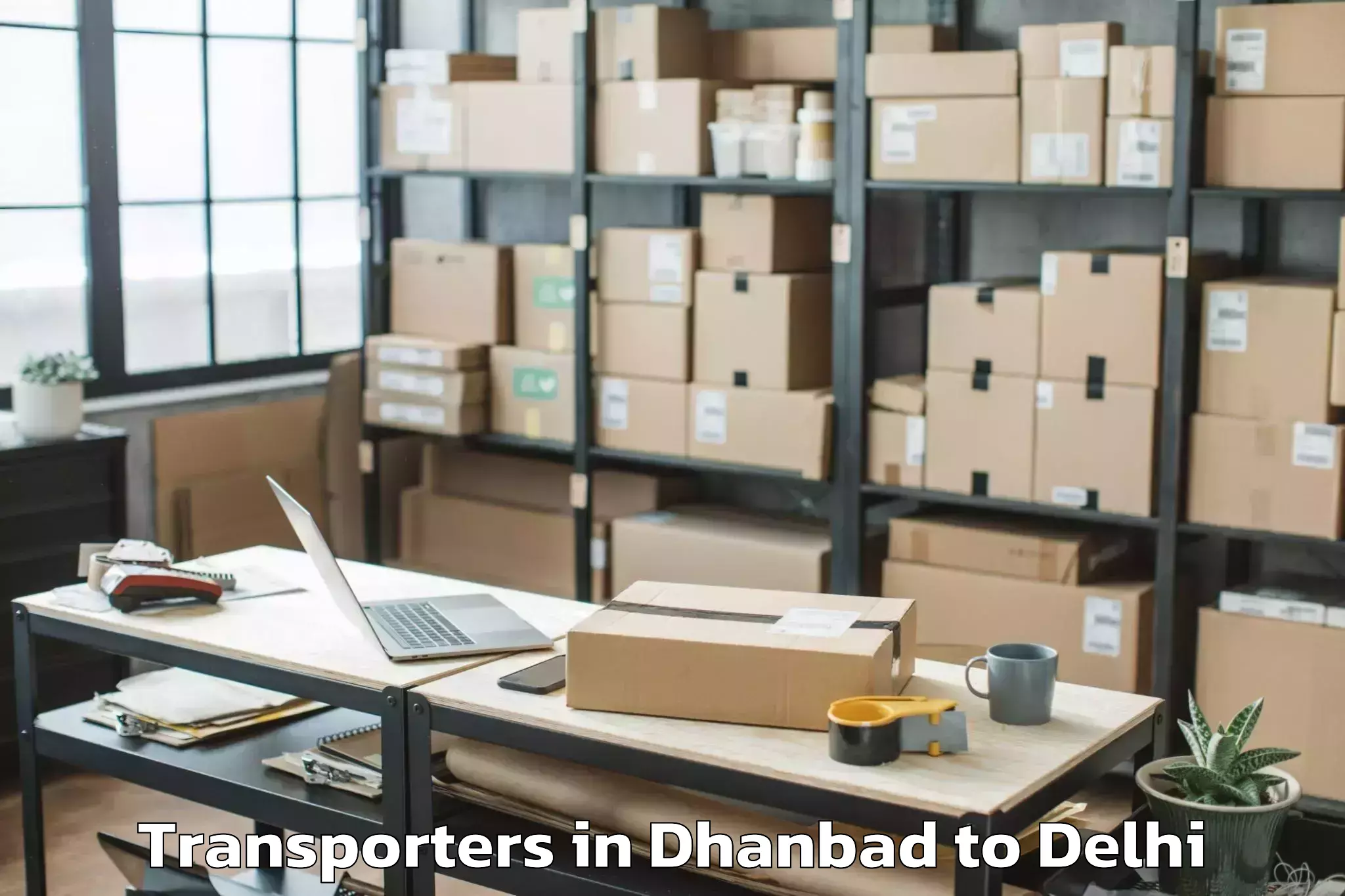 Book Dhanbad to Jamia Millia Islamia New Delhi Transporters